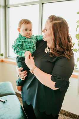 Dr. Kathleen holding boy