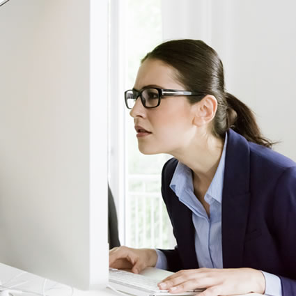 Office woman sitting on desk