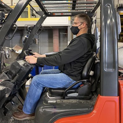 Man Driving Forklift