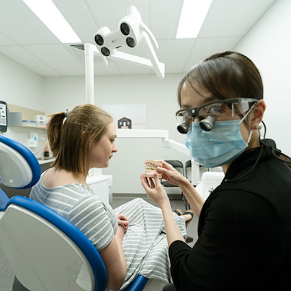 Patient in chair with dentist