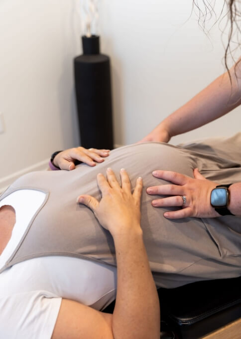 adjusting pregnant woman