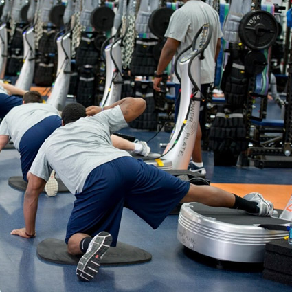 Men exercise using Power Plate