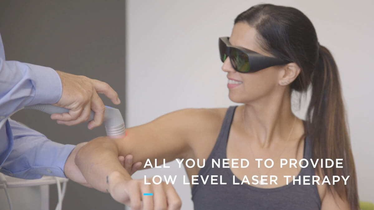 Woman getting laser treatment on arm