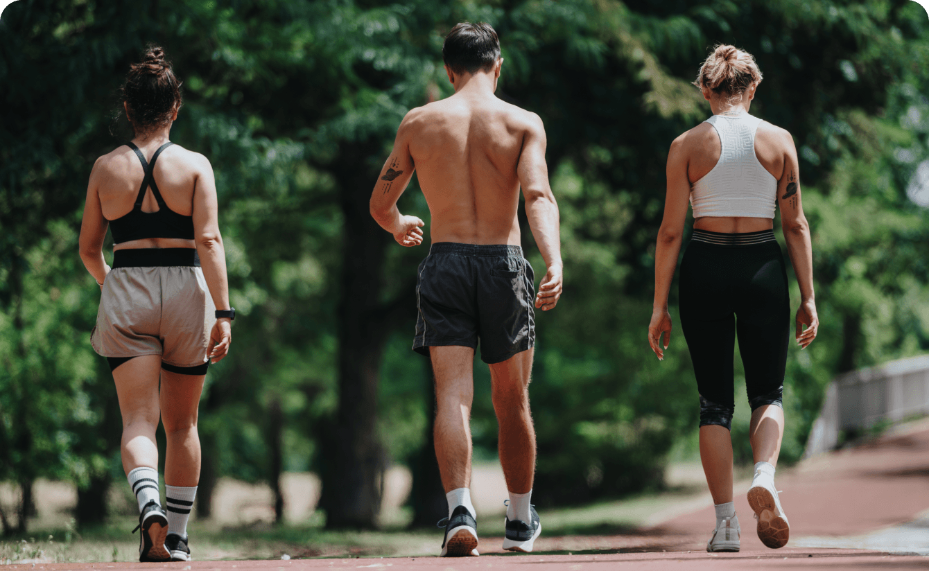 men and women working out outdoors