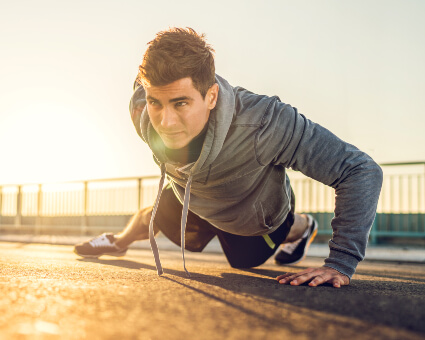 Male athlete exercising outdoors
