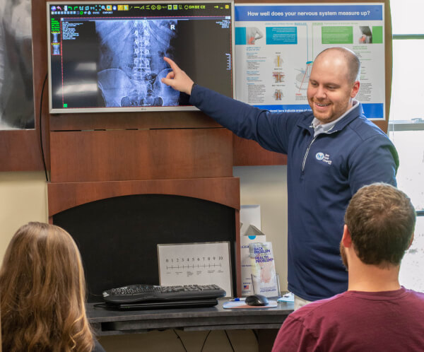 Kernersville patients in a chiropractic consultation
