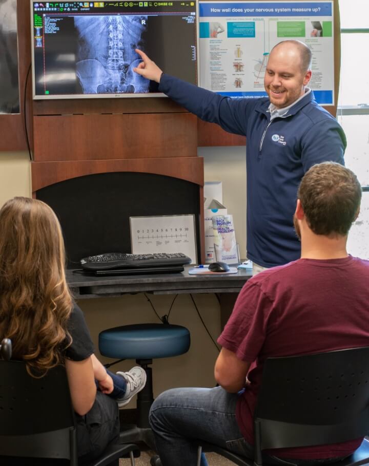 Dr. Craig talking to patients