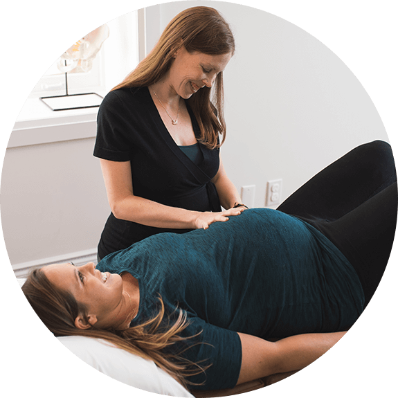 Dr. Alyssa adjusting pregnant mom