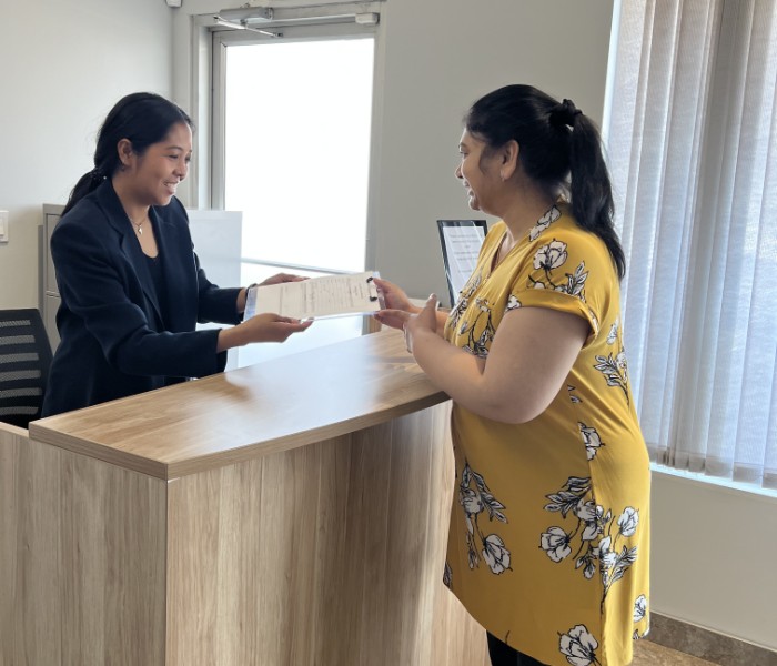 Women at reception desk