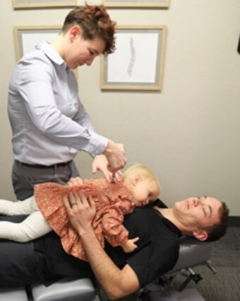 Dr. Kennedy treating pediatric patient