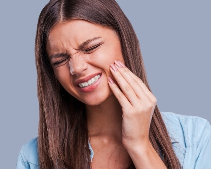 Woman with TMJ pain