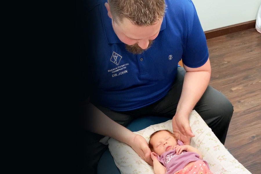 Doctor adjusting infant