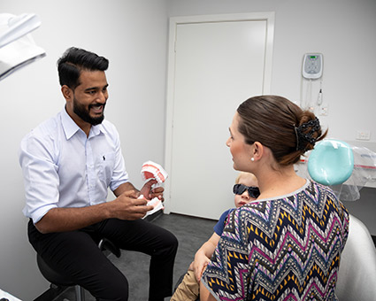 Dentist with patient