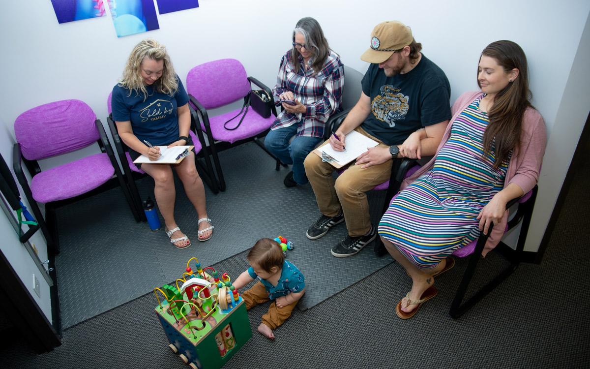 Patients sitting in a waiting room