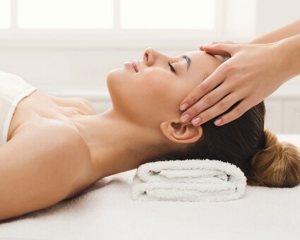 Female patient in massage therapy session