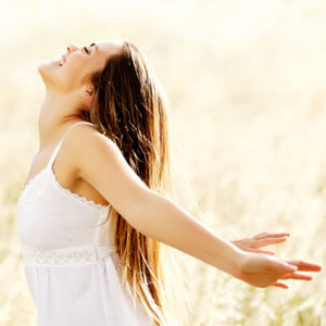 Blissful woman in field