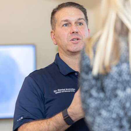 Boulder chiropractor in a consultation with a patient
