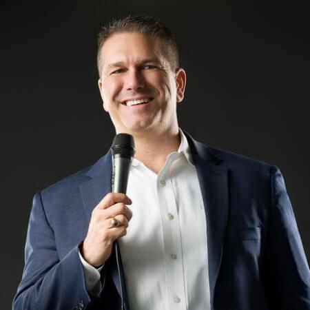 Dr. Daniel talking on mic