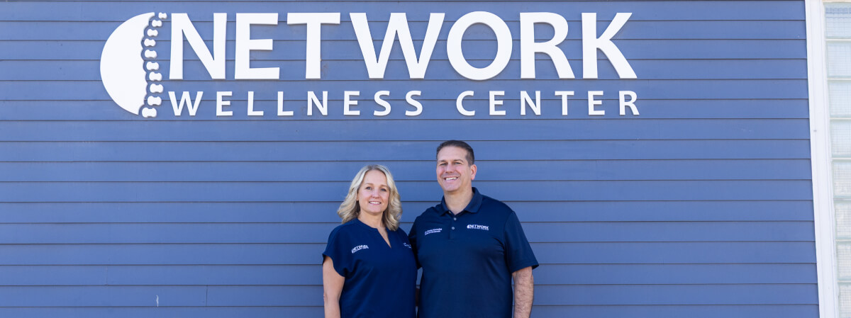 Dr. Daniel and Dr. Richelle standing outside the office