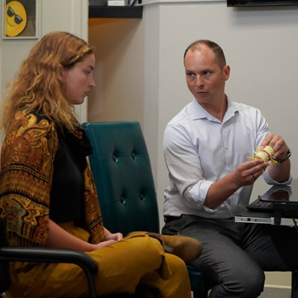 Dr. Bjorn talking with patient