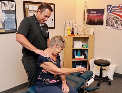 Woman getting neck adjustment