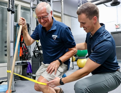 Man receiving physiotherapy treatment