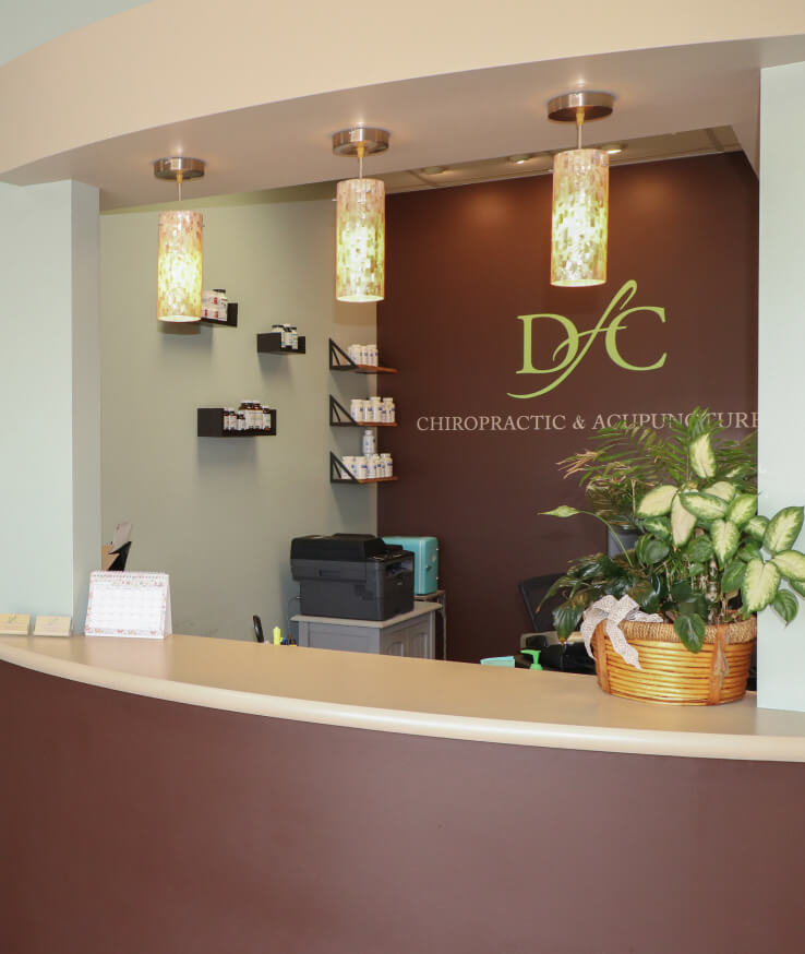 Dickinson Chiropractic & Acupuncture patient checking in at our front desk