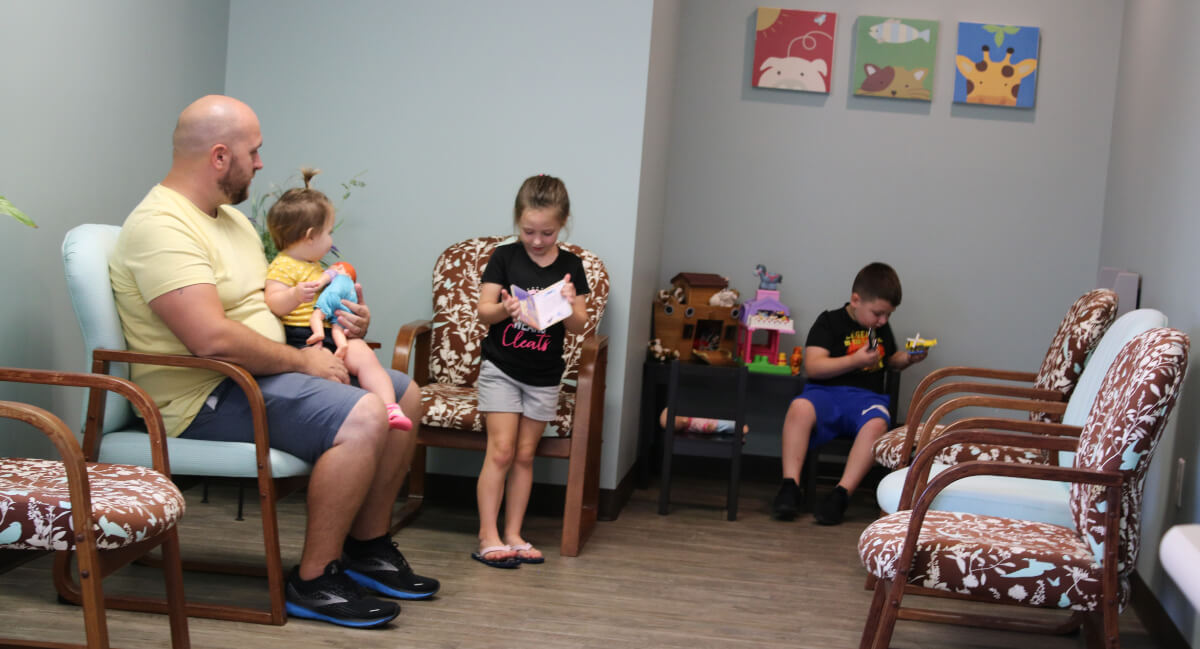 Evansville patients sitting in Dickinson Chiropractic & Acupuncture waiting room