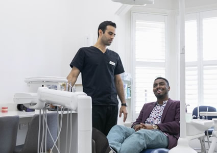 Dentist with patient