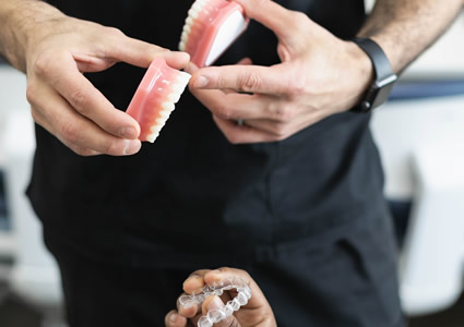 Doctor pointing to gums