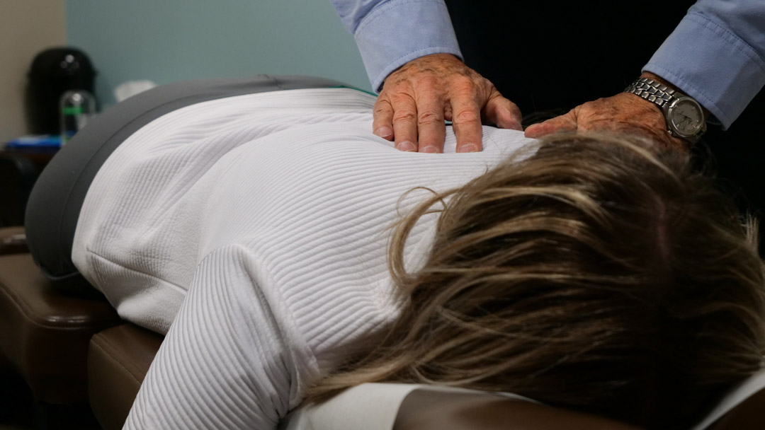 patient getting chiropractic massage on their back