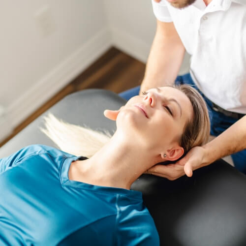 patient having neck massage
