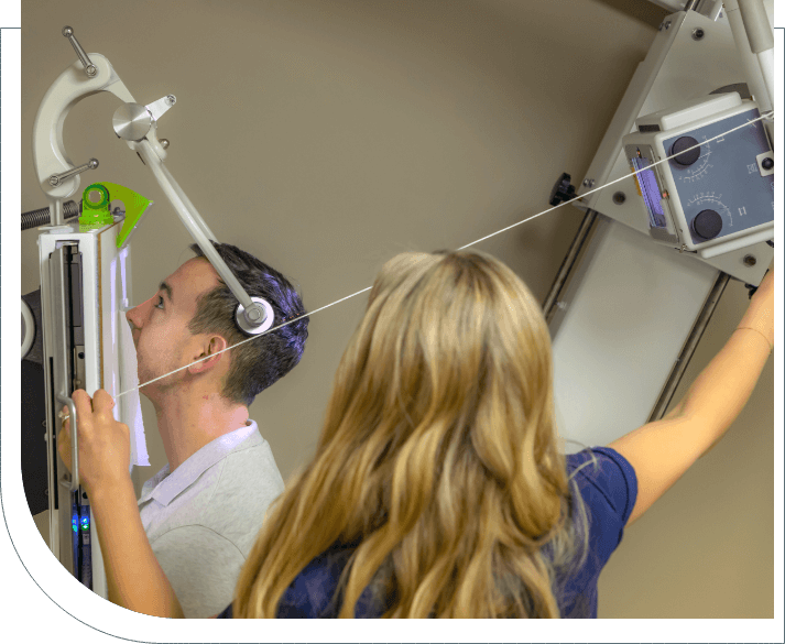 doctor taking scan of patients head