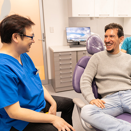 Dr Andrew with male patient 