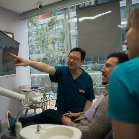 St. Leonards Square Dental Care patient talking with our team