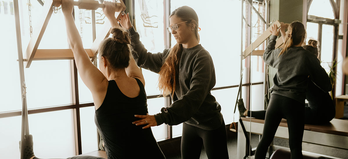 person during pilates class