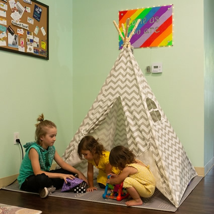 Kids playing in tent