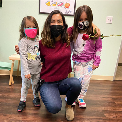 Our chiropractor with some children patients