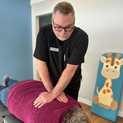 Dr. Chuck mid back adjustment