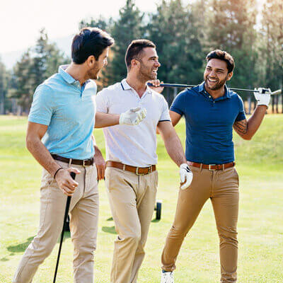 Men golfing