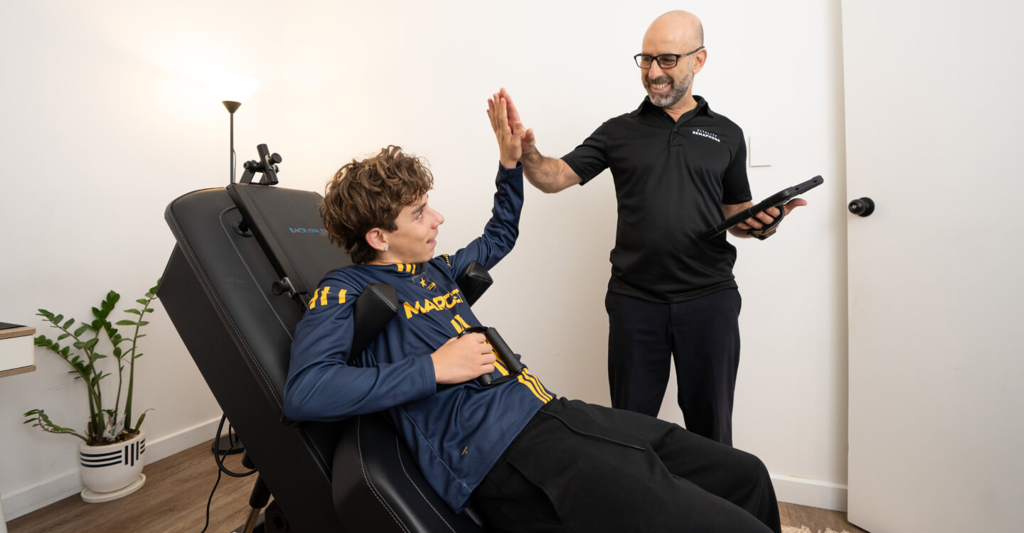 $pj chiropractor Dr Mario high fiving patient