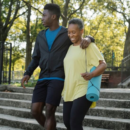 mother and son walking together