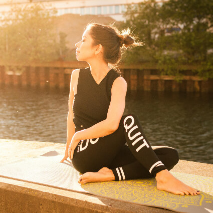 Woman stretching outdoors