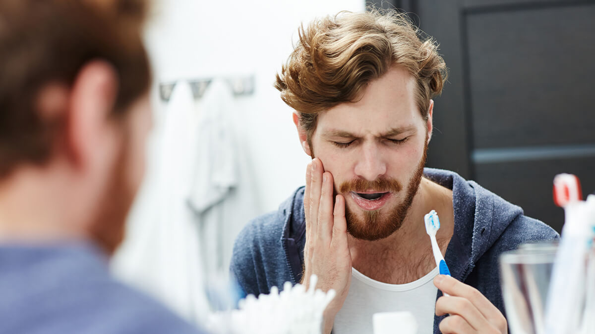 Man with tooth pain