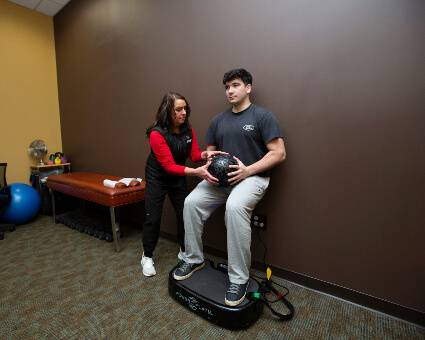 Man using Power plate machine