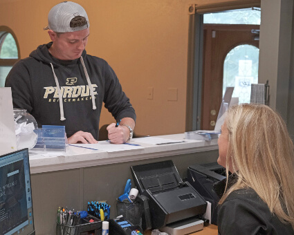 Man completing paperwork