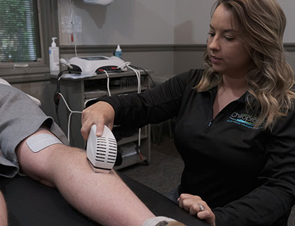 Man getting therapeutic ultrasound on legs