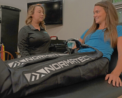 Patient receiving Normatech treatment