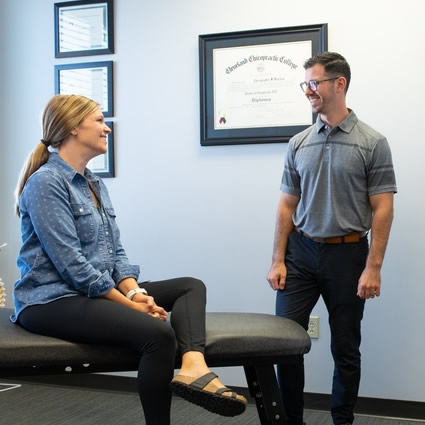 Dr. Harlan talking to patient