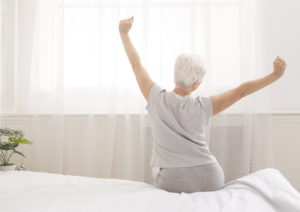 woman-stretching-out-of-bed